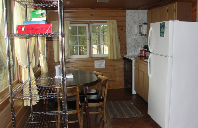 Cottage kitchen and dining area at Pine Point Lodge.