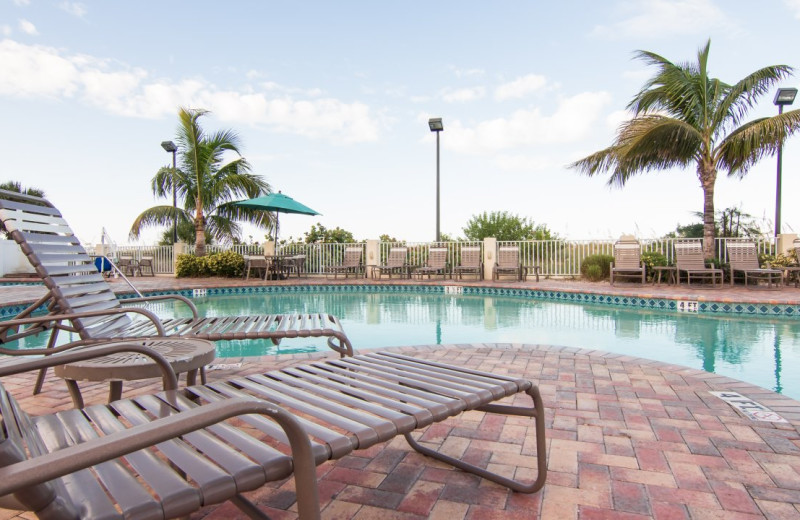 Outdoor pool at Sunset Vistas Beachfront Suites.