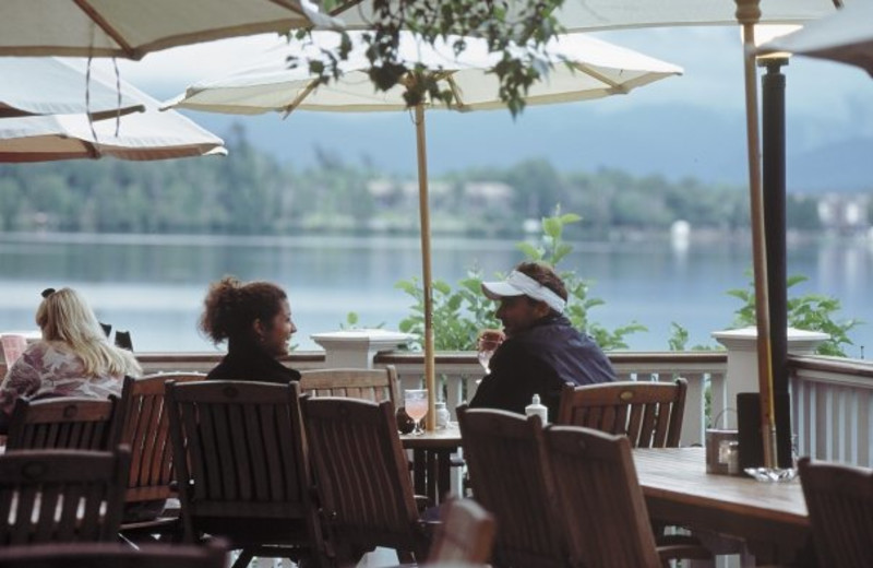 Deck dining at Mirror Lake Inn Resort & Spa.