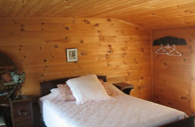 Cabin bedroom at The Cabins on Harvey's Lake.