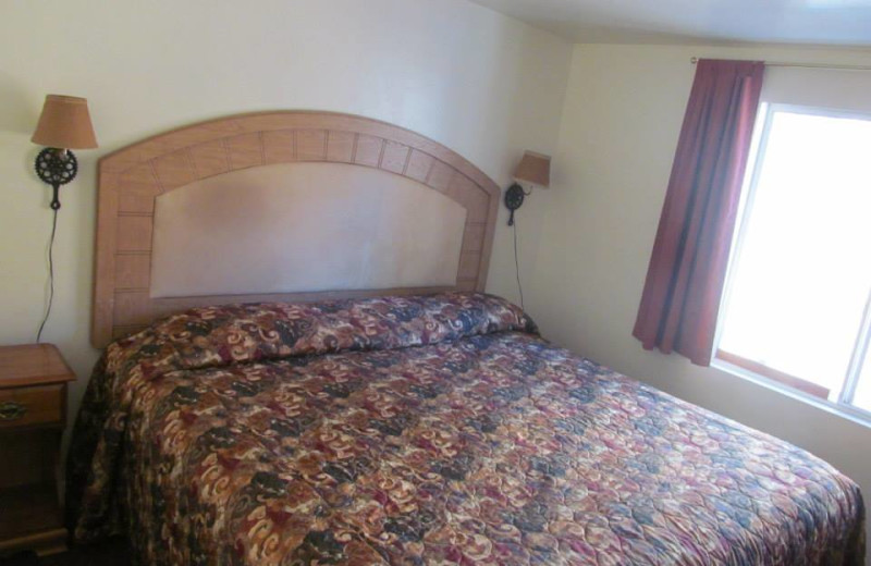 Cabin bedroom at Lazy Oaks Resort.