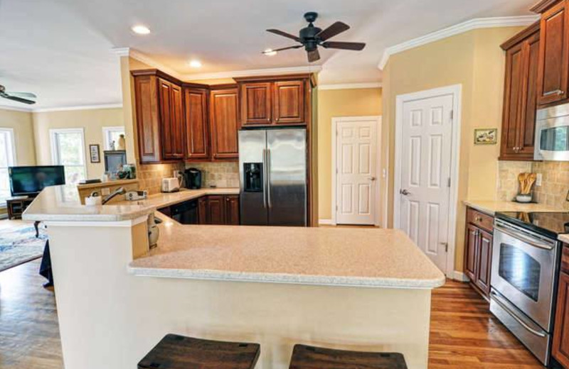 Vacation rental kitchen at Century 21 Action Inc.
