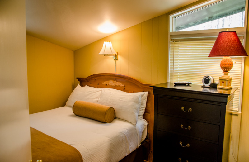 Cabin bedroom at Asheville Cabins of Willow Winds.