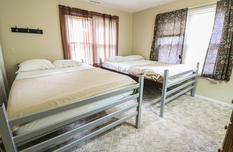 Cabin bedroom at Sand Lake Resort.