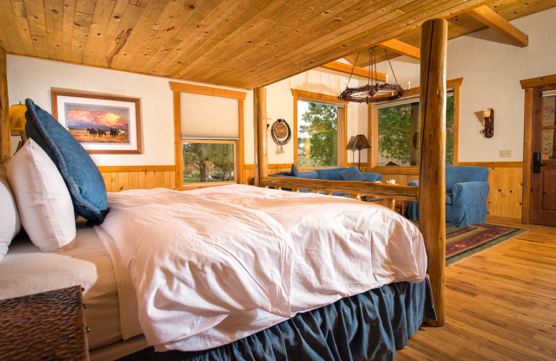 Cabin bedroom at Sorrel River Ranch Resort & Spa.