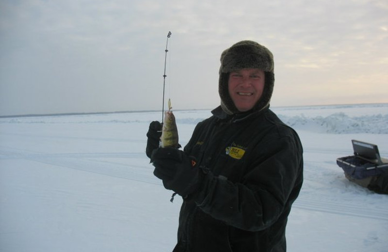 Fishing on the ice at Appeldoorn's Sunset Bay Resort.