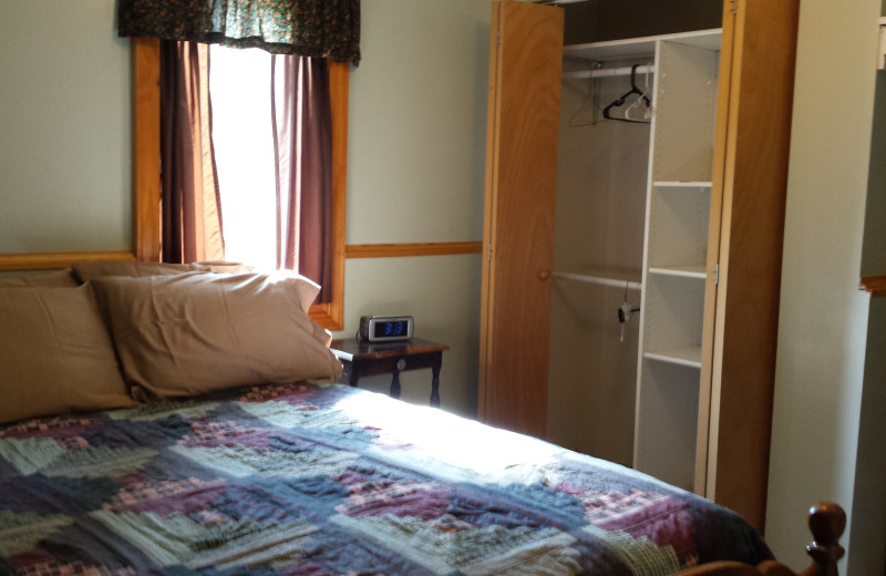 Cabin bedroom at SweetWater Resort.