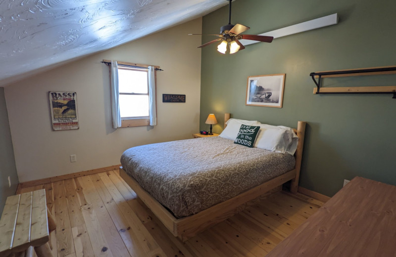 Cabin bedroom at Campfire Bay Resort.