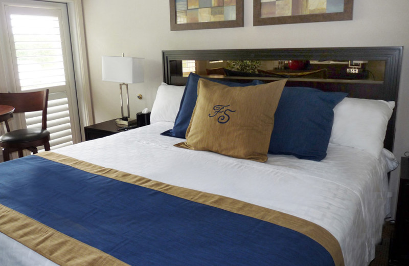 Guest bed at Fairway Suites.