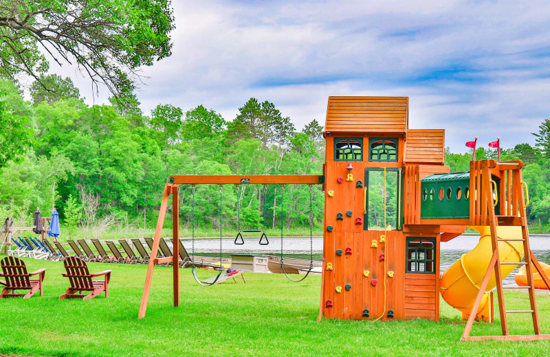 Beach and playground at Lost Lake Lodge.