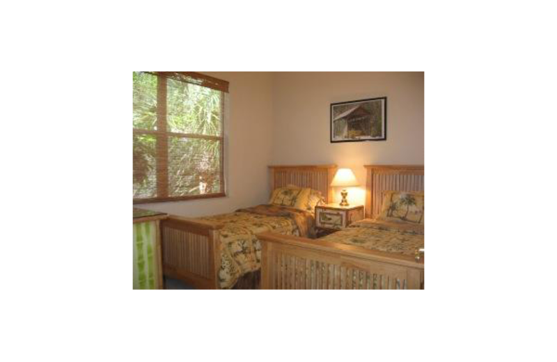 Vacation rental bedroom at Sunshine Resort Rentals, LLC.