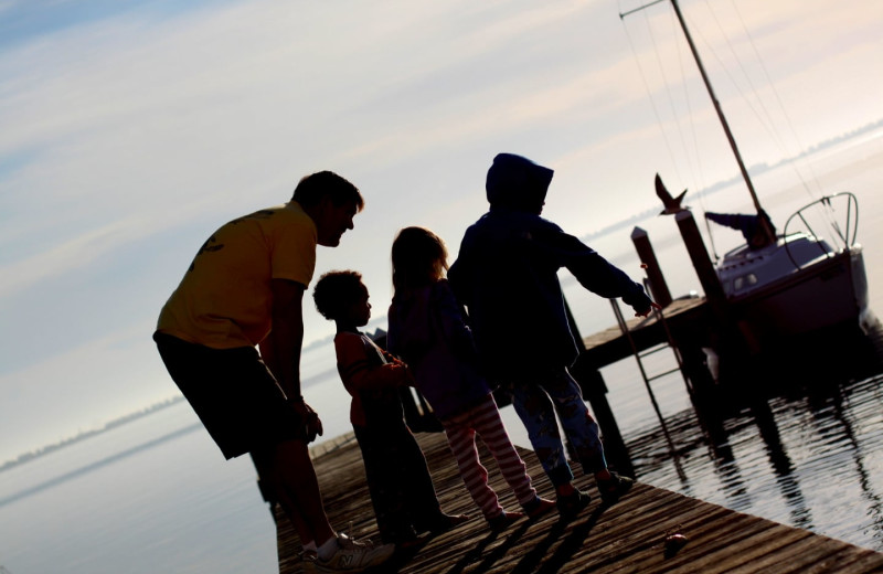 Family fishing at Pirate's Cove Realty.