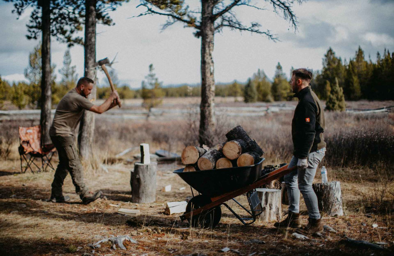 Chopping wood at Big Creek Lodge.