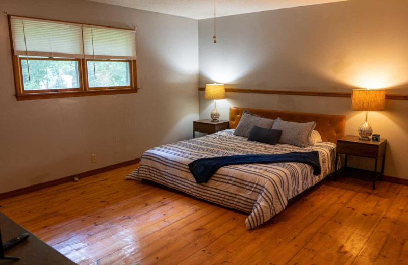 Cabin bedroom at Copper John's Resort.
