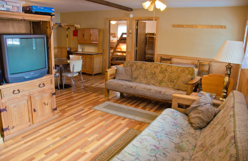 Cabin living room at Tri Lake Timbers Resort.