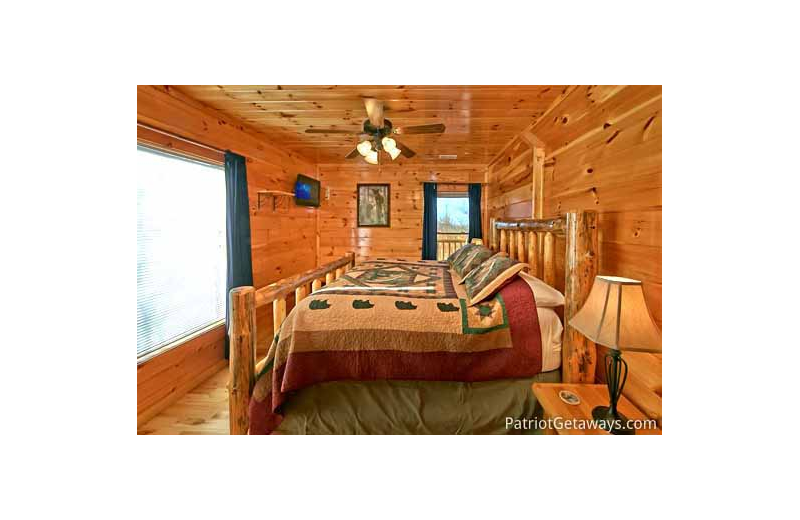 Bedroom at American Patriot Getaways - A Tree Top Lodge.