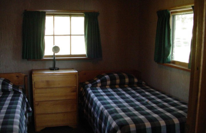 Cabin bedroom at Pipestone Point Resort.