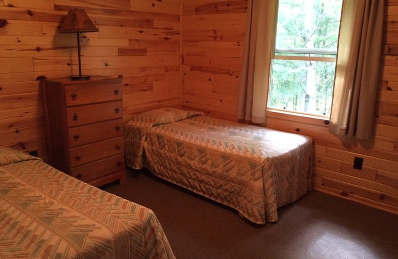 Cabin bedroom at Muskego Point Resort.