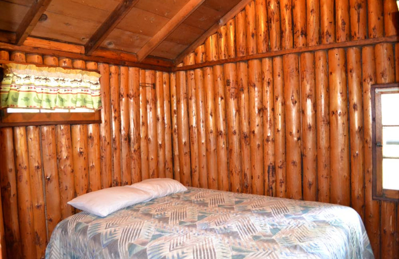 Cabin bedroom at Sand Lake Resort.