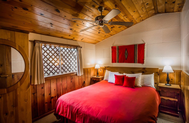 Cabin bedroom at Briar Patch Inn.