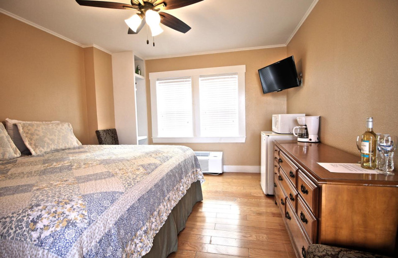 Guest room at Peach Tree Inn & Suites.