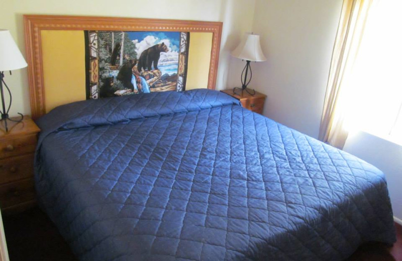 Cabin bedroom at Lazy Oaks Resort.