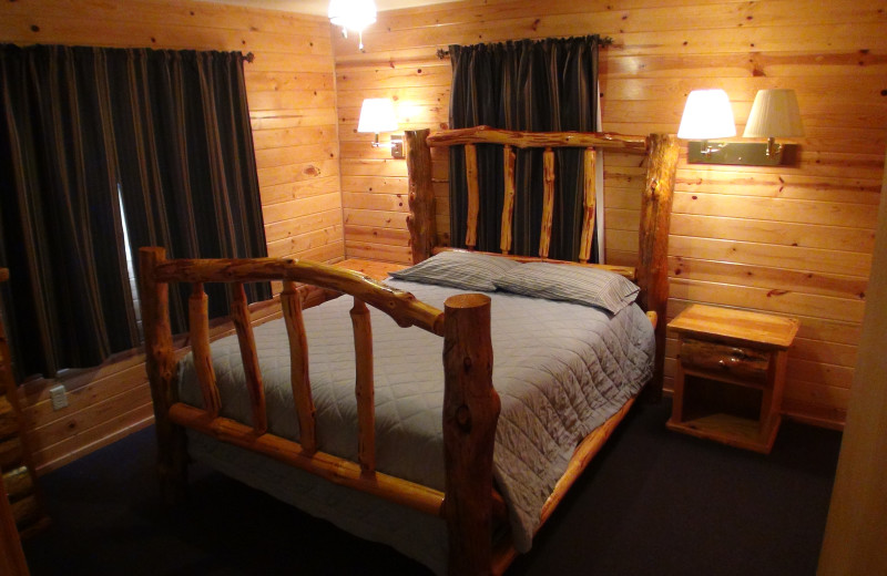 Cabin bedroom at Acorn Hill Resort.