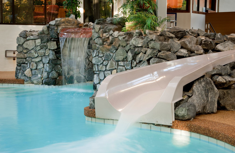 Indoor Pool Waterslide and Cascading Waterfall at the Summit Resort.