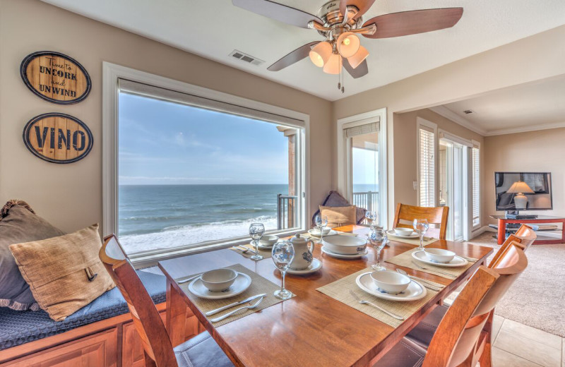 Rental dining room at Cavalier Beachfront Condominiums.