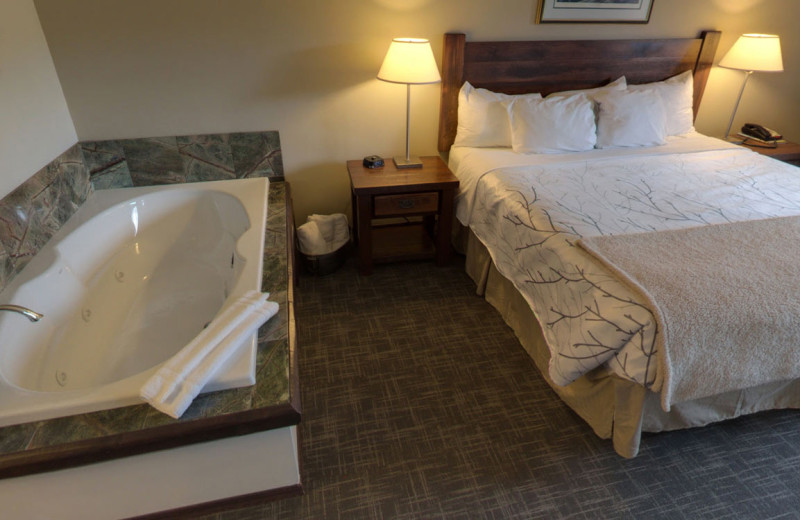 Guest room with hot tub at Open Hearth Lodge.