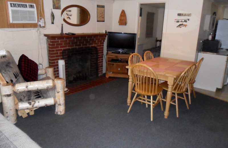 Cottage living room and dining area at King Creek Resort & Marina.