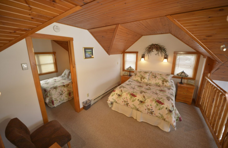 Cottage bedroom at Placid Bay Inn.