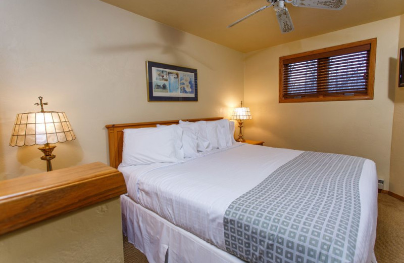 Guest bedroom at Waterbury Inn Condominium Resort.