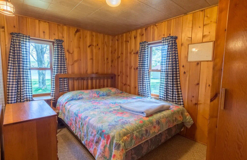 Cottage bedroom at Fisher's Lakeside Cottages.