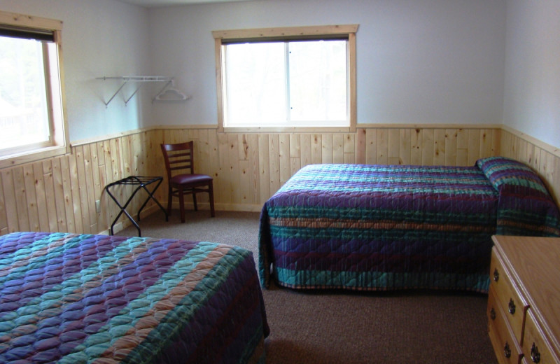 Cabin bedroom at Gull Four Seasons Resort.