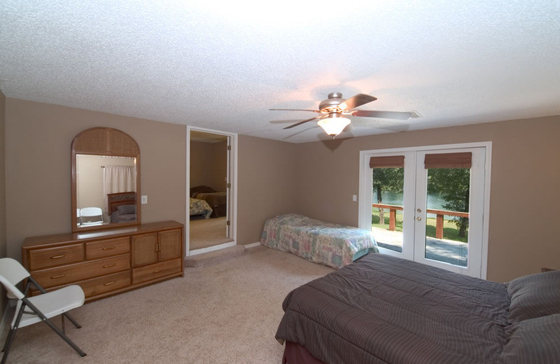 Cottage bedroom at Norfork Resort & Trout Dock.