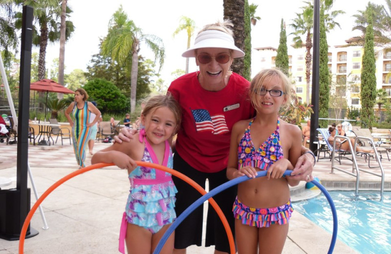 Family by the pool at Floridays Resort Orlando.