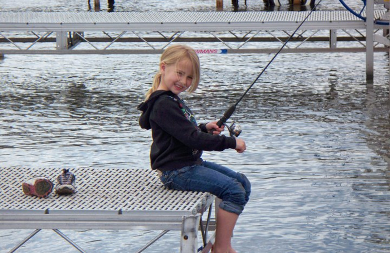 Fishing off the dock at Auger's Pine View Resort.