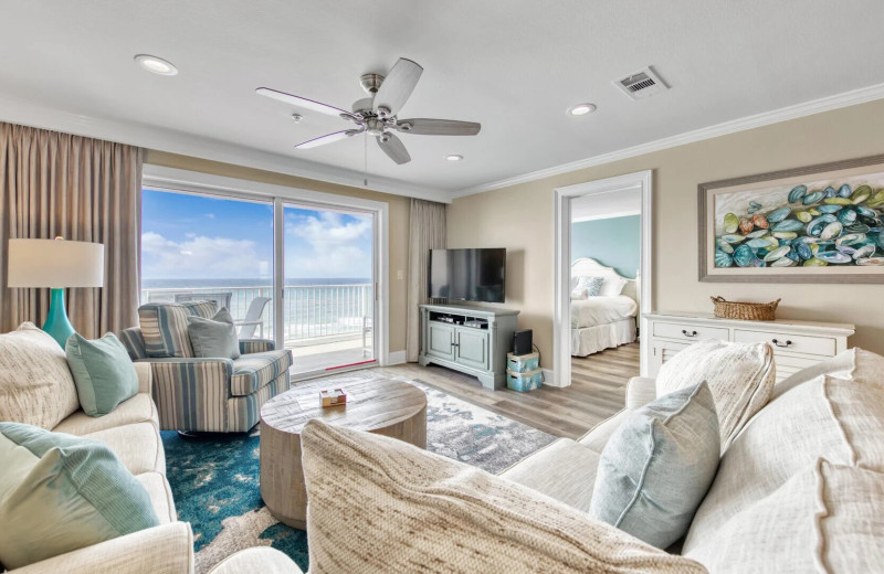 Rental living room at Emerald Coast Vacation Rentals and Sales.