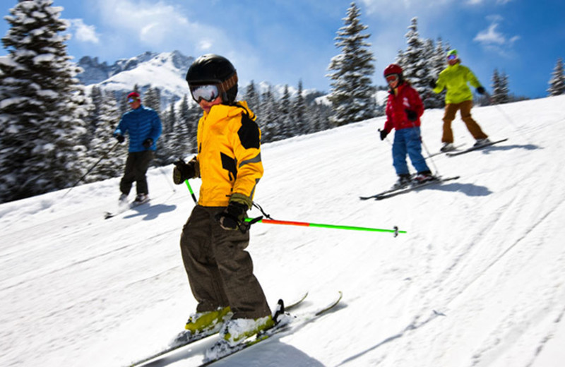 Family skiing at Fireside Resort at Jackson Hole.