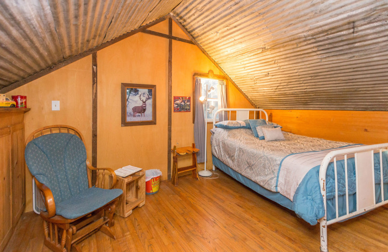 Cabin bedroom at Creekside Camp & Cabins.