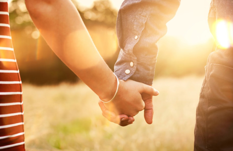 Couple holding hands at Oglebay Resort and Conference Center.