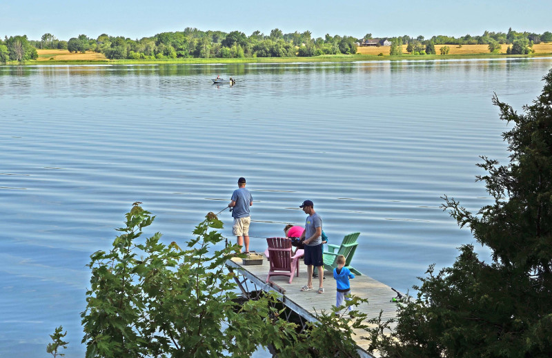 Fishing at Sandbanks Summer Village Cottage Resort.