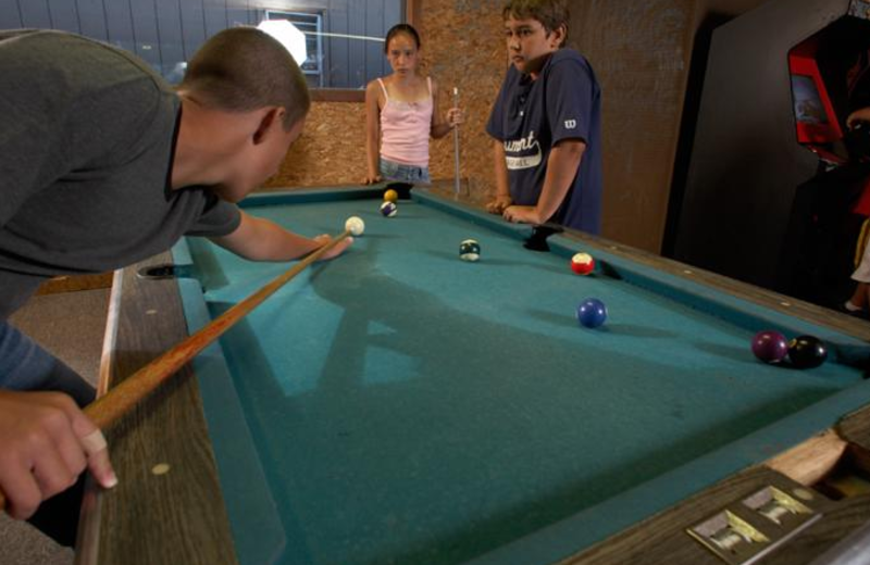 Game room at Acra Manor Resort.