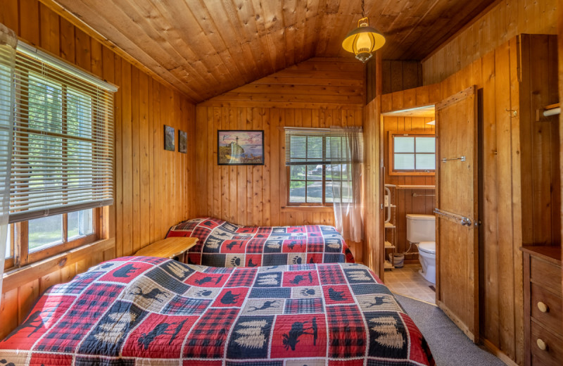 Cabin bedroom at Rising Eagle Resort.