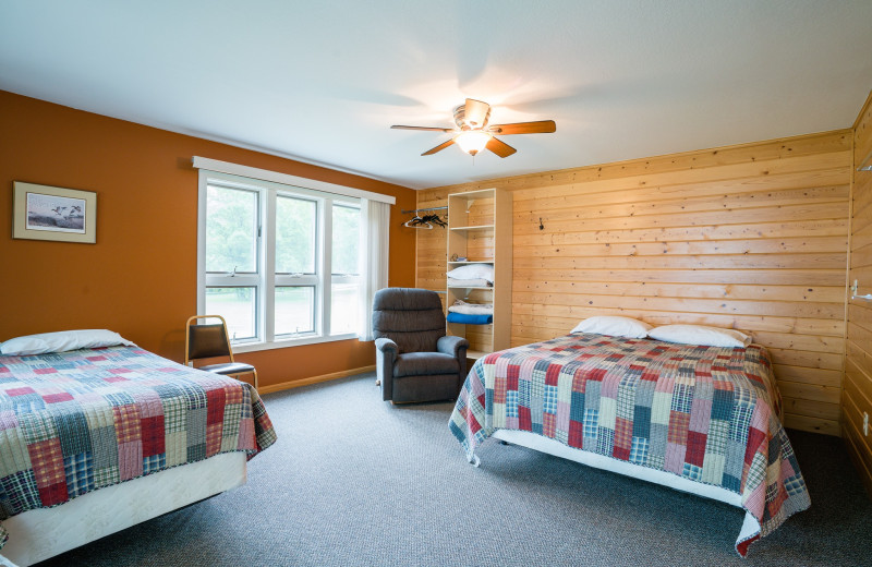 Cabin bedroom at Otter Tail Beach Resort.