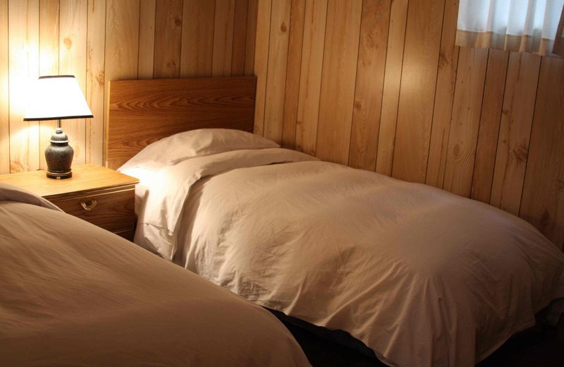 Cottage bedroom at The Cottages At Clear Lake.