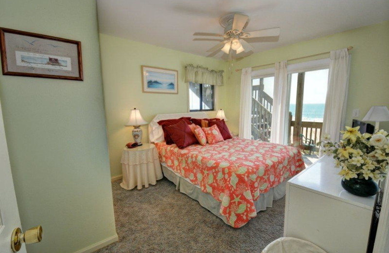 Vacation rental bedroom at Century 21 Action Inc. 