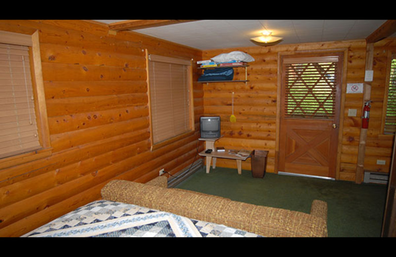 Cabin bedroom at Sourdough Lodge.