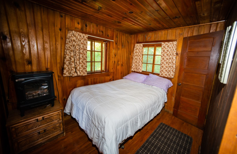 Cabin bedroom at North Shore Lodge & Resort.